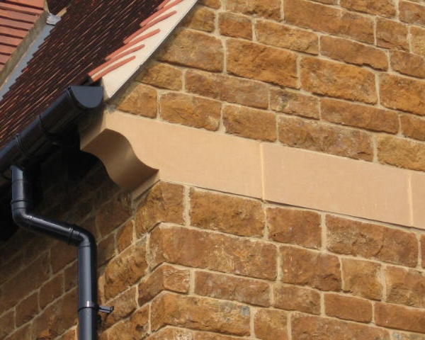 Corbels on a building by the roof line