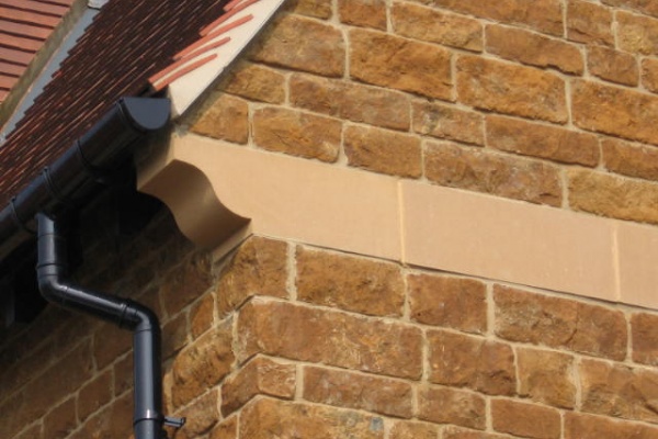 Corbels on a building by the roof line